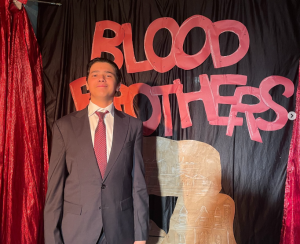 Senior high school student performing in a school play